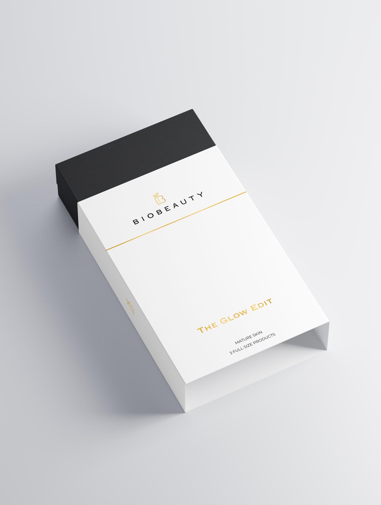 The Glow Edit skincare box by BIOBEAUTY featuring three signature glow-enhancing products on a neutral background