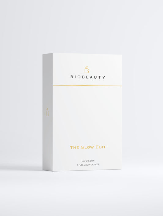 The Glow Edit skincare box by BIOBEAUTY featuring three signature glow-enhancing products on a neutral background

